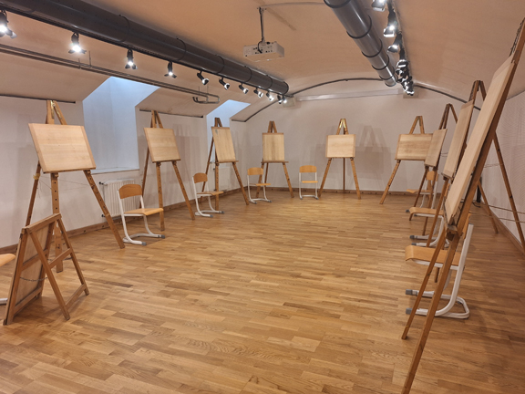 Kletka Hall at Cankarjeva 5, operated by Public Fund for Cultural Activities of the Republic of Slovenia.