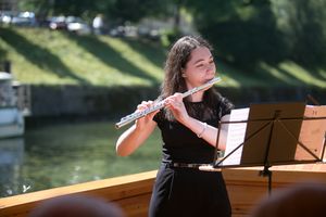 Ana Votupal partaking in a series of classical music concerts held at the Ljubljanica river, <!--LINK'" 0:305-->, 2016