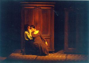 <i>Cricket in the Fist</i> by Muzeum Theatre, staged at the VIBA Studio, St. Joseph's Church, 1994. "The image simbolizes theatrical and art historical iconography as a time machine travelling back into middle age, to the gesture of the written word." Performing: <!--LINK'" 0:200--> and <!--LINK'" 0:201-->