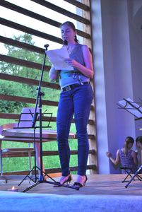 <!--LINK'" 0:32-->, a translator, reading Rivera's poems at the Museum of Baroque in Šmarje pri Jelšah, <!--LINK'" 0:33--> 2015
