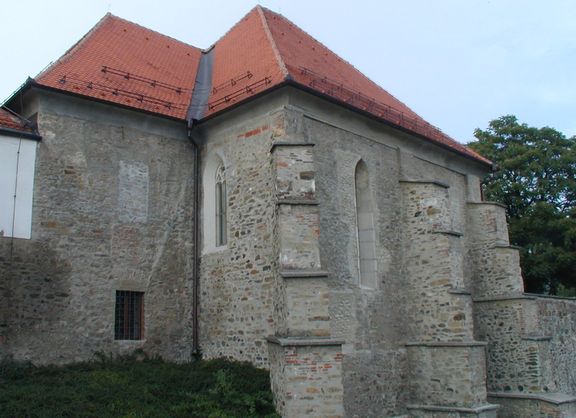 The south-east view of the synagogue after its restoration in 2001. The building forms a part of the Maribor medieval town walls above the Drava River; Center of Jewish Cultural Heritage Synagogue Maribor.