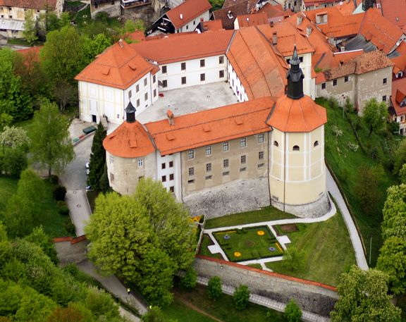 The view of the Loka Castle located in Škofja Loka. Since 1959 the castle serves as the main venue for the archaeological, ethnological, art history, and other collections of the Loka Museum .
