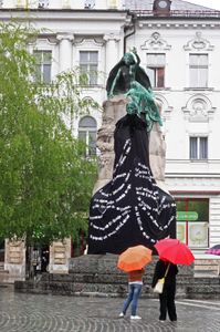<i>Prešeren's Coat</i>, by <!--LINK'" 0:503-->, art installation using passages from the poet's longest poem <i>Krst pri Savici</i>[Baptism at Savica] on a new robe dressing Prešeren's monument,  <!--LINK'" 0:504-->, 2010