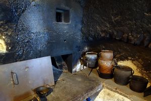 Black kitchen (Črna kuhinja) with an open fireplace and bread oven, <!--LINK'" 0:309-->, 2013