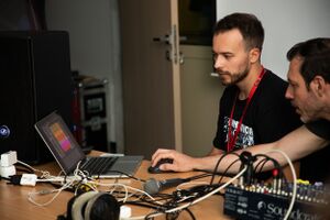 <i>Creating music with (un)ordinary object</i>, music workshop at the 26th <!--LINK'" 0:130--> in Velenje. Photo: Lara Lukše