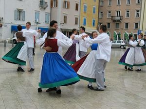 Members of the <!--LINK'" 0:220--> dancing at the Saltworkers Festival (Solinarski praznik), 2004