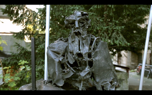 A still frame from <!--LINK'" 0:277--> promo video featuring a bust of <!--LINK'" 0:278-->, the leading Slovene Impressionist painter and patron of arts. A public sculpture created by <!--LINK'" 0:279--> in 1969 is located in front of the <!--LINK'" 0:280-->. Shot in 2013.