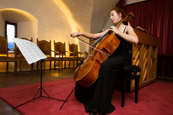 The young and highly talented cellist Zala Vidic, playing at the Knights' Hall of the Bled Castle, 2016