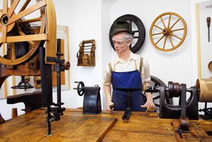 A display of old woodworking procedures at the <!--LINK'" 0:377-->, 2014