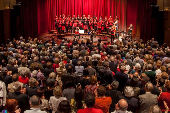 The Kombinat Choir singing at the big concert hall of the Nova Gorica Arts Centre, 2014