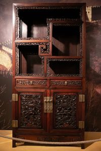 An exquisite Chinese wooden cabinet, one of the artifacts exhibited at the <!--LINK'" 0:81--> in the Skušek Collection, the largest collection of Chinese objects in Slovenia.