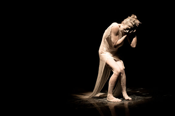 Tanja Zgonc doing her butoh piece – titled Tulkudream – on the stage of Maribor Puppet Theatre at the Festival Performa & Platforma, 2017
