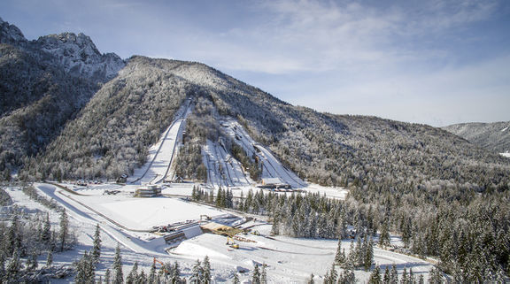 Ski jumping hills in Planica, a complex being designed by Studio AKKA (landscape architecture) and A.biro (ski jumps and bridges), with the adjacent buildings by STVAR architects, 2015
