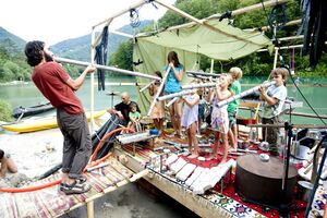 Music workshop for children with Slovenian multi-instrumentalist <!--LINK'" 0:302--> at <!--LINK'" 0:303--> in 2015. Author: Iztok Zupan