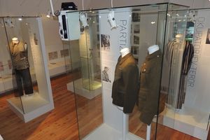 <i>Bohinj 1941&ndash;1945</i> exhibition section at the <!--LINK'" 0:509-->. It features the four dwellers of Bohinj, who during the World War II impersonated different roles: of an an agressor, a partisan, a priest and a prisoner, respectively.